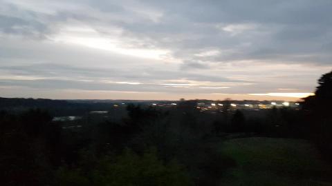 ROOF OF ABANDONED MANSION... VIEW OVER THE CITY