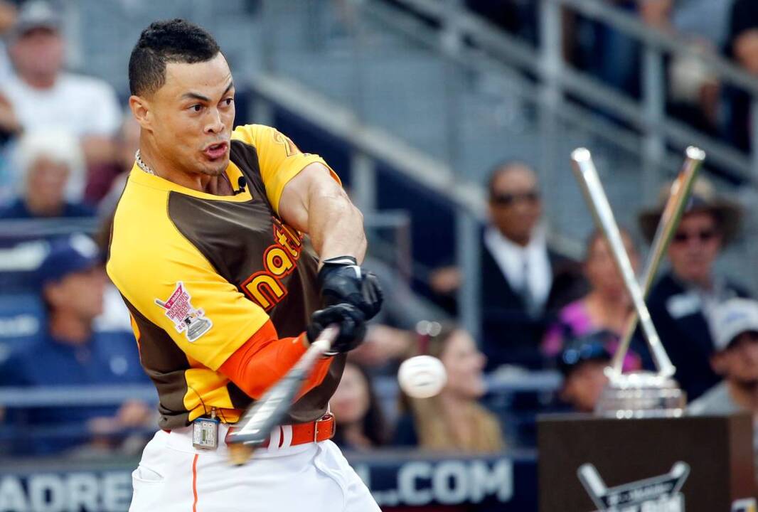 Marlins' Giancarlo Stanton absolutely annihilates a tire during workout