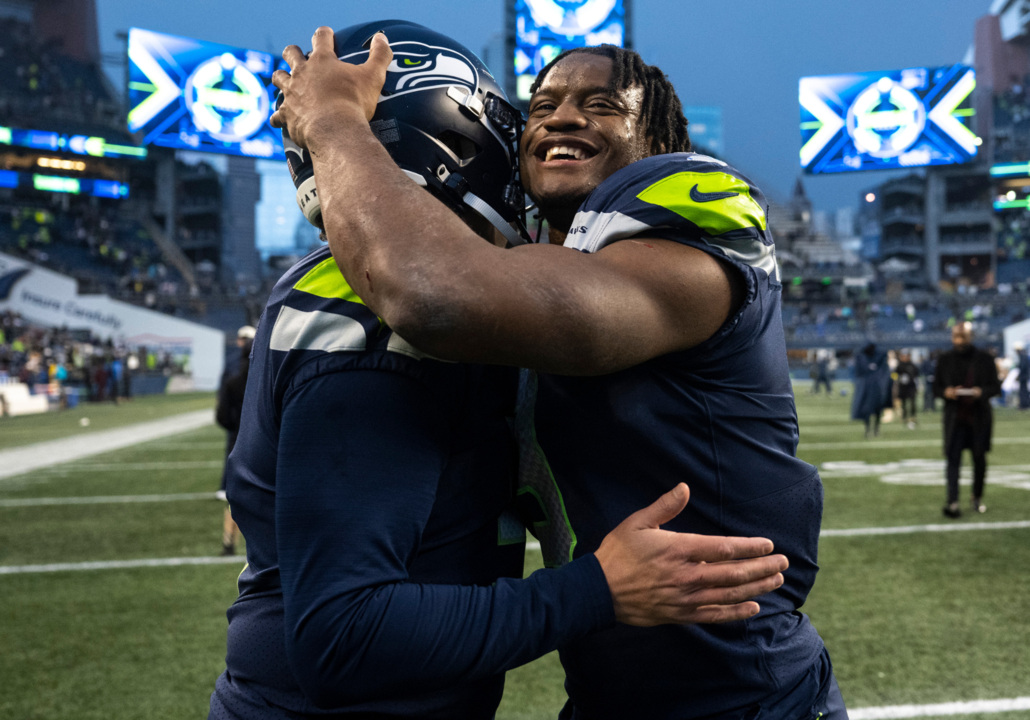 Curt Warner of the Seattle Seahawks carries the ball against the