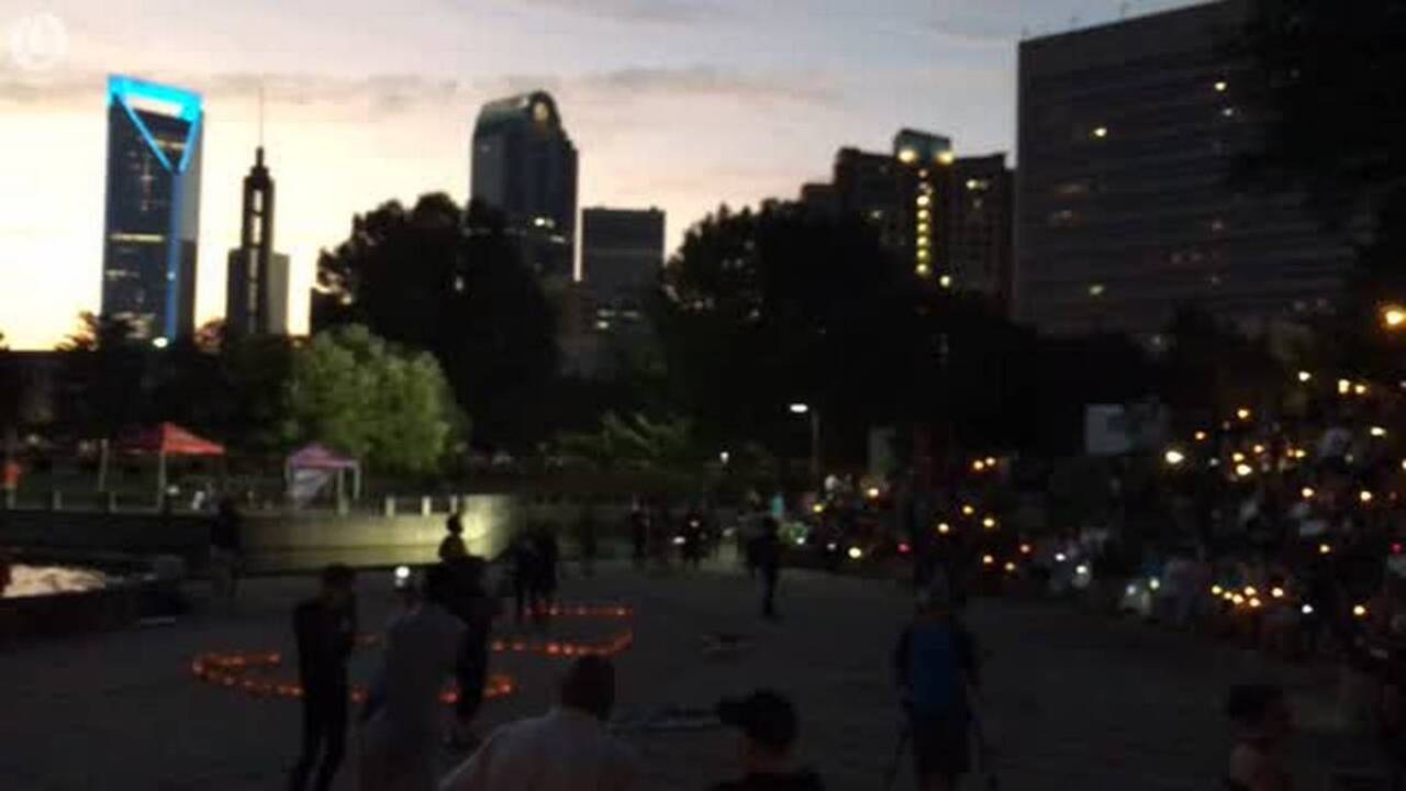 Candles are lit at Charlotte Uprising vigil Charlotte Observer