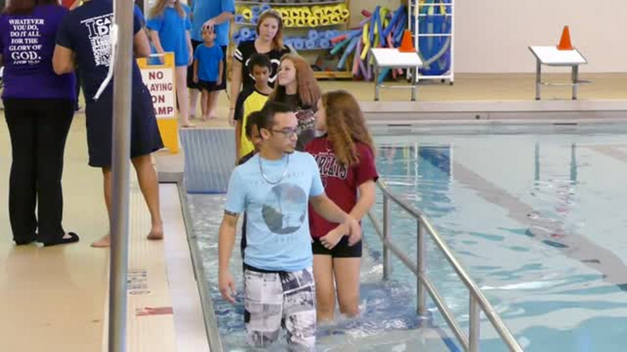 Families get publicly baptized at Rock Hill Aquatics Center | Rock Hill ...