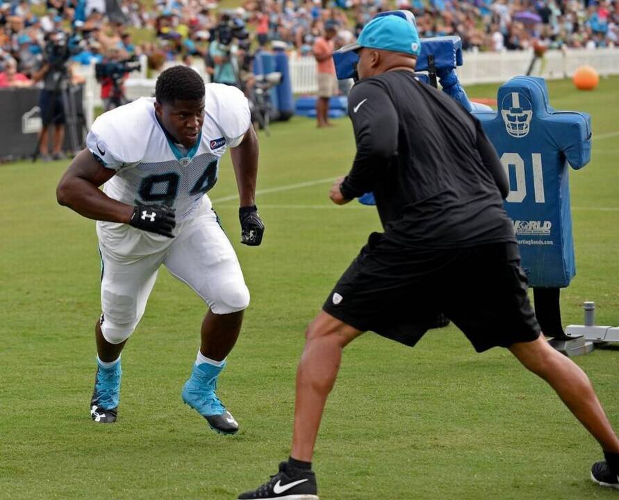 AP Source: Panthers bring back Julius Peppers, trade DE Kony Ealy