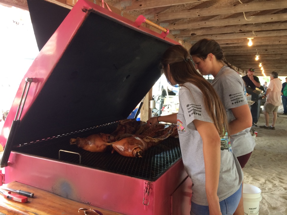 Sisters cook whole hog barbecue during 2018 SC BBQ Shag Festival in
