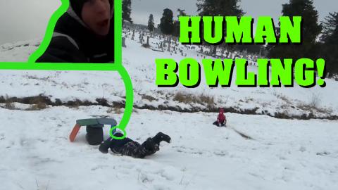 Human Snow Bowling!