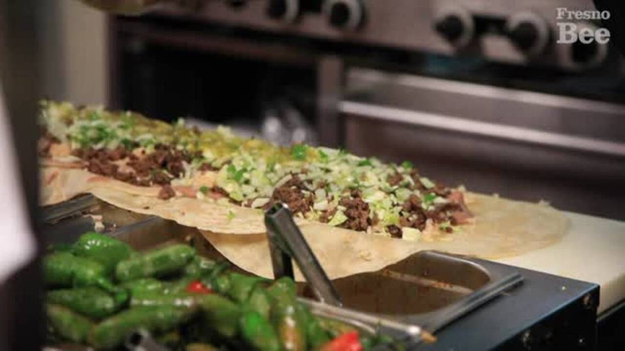 You can get this giant burrito at a Central Fresno taqueria Fresno Bee