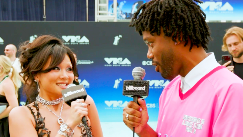 billboard.com - Stefanie Tanaka - Rei Ami Says Lady Gaga's Meat Dress Is Still Iconic & Shares Her Favorite Taylor Swift Music Video | VMAs 2026