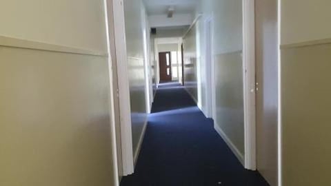 Abandoned war barracks corridors 