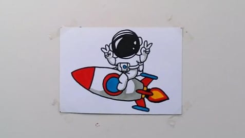 Drawing astronaut riding rocket with peace head cartoon