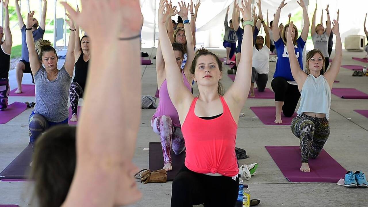 Practicing Yoga In Honor Of Mothers At Kauffman Stadium Kansas City Star