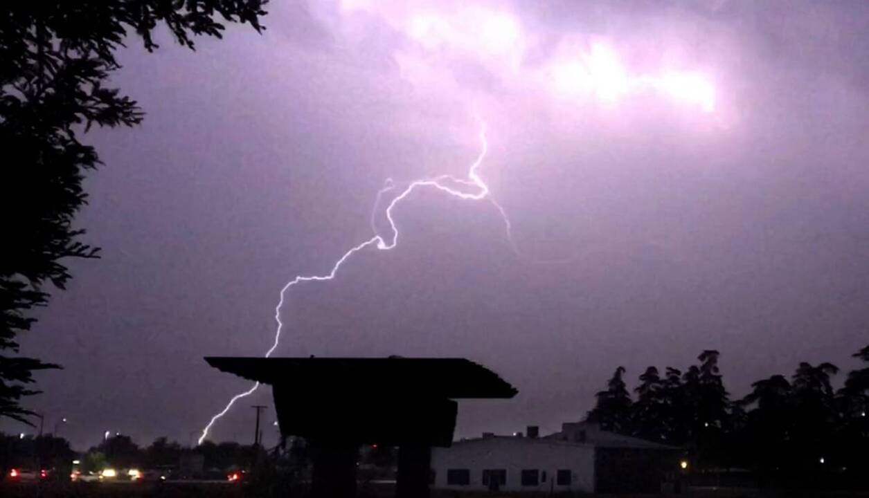 Thunderstorm lights up Clovis sky Fresno Bee