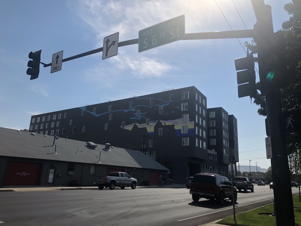 Artist David Carmack Lewis' mural on Boise's The Fowler apartments