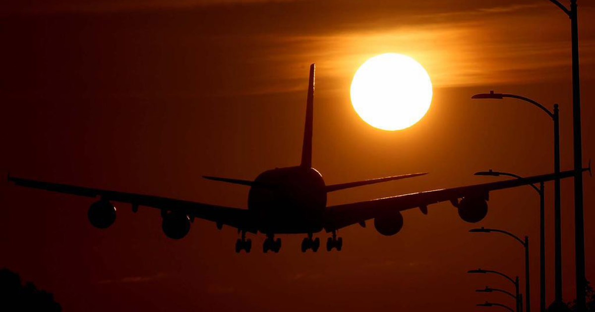 A plane lands at Los Angeles International Airport on Wednesday evening.