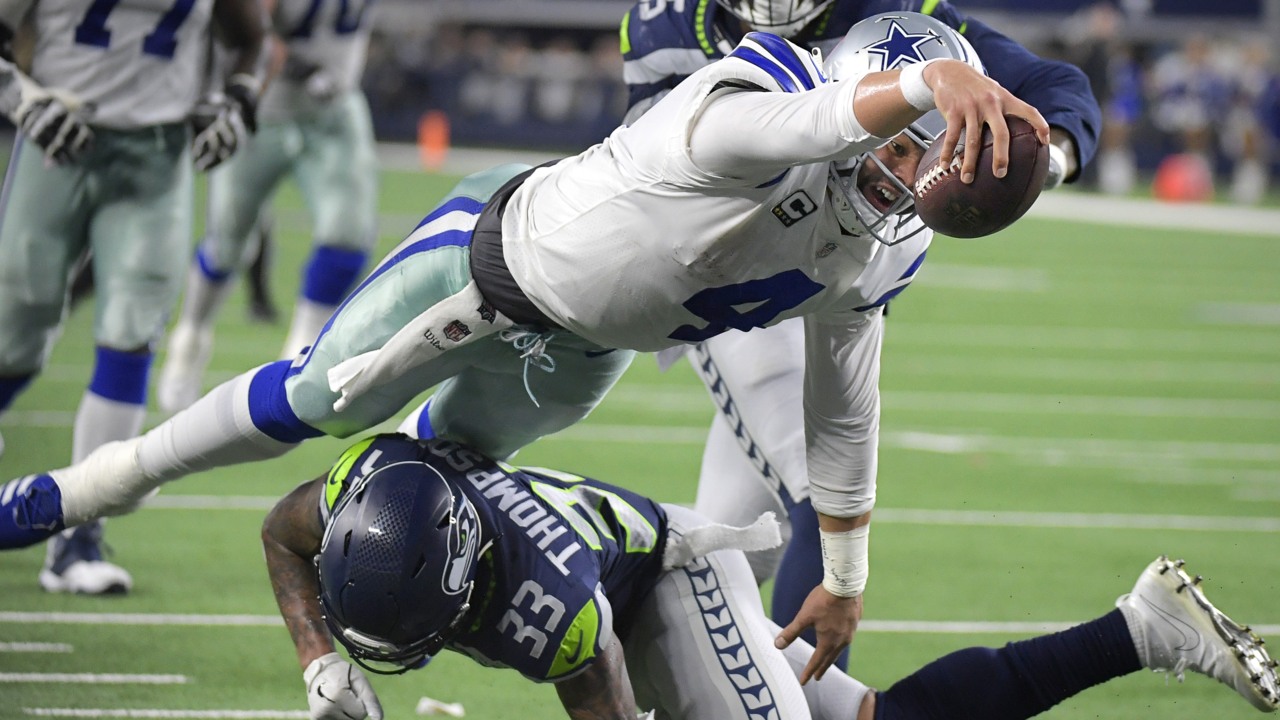 Elliott, Cowboys power past Seahawks for 24-22 wild-card win