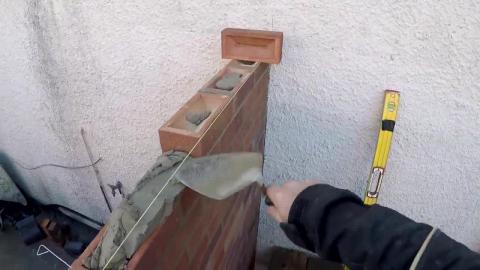 Chilling out laying a brick wall... Nice