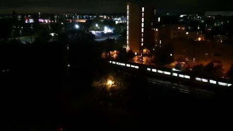 CHILLING ON A ROOFTOP WATCHING A TRAIN GO BY. CALM!