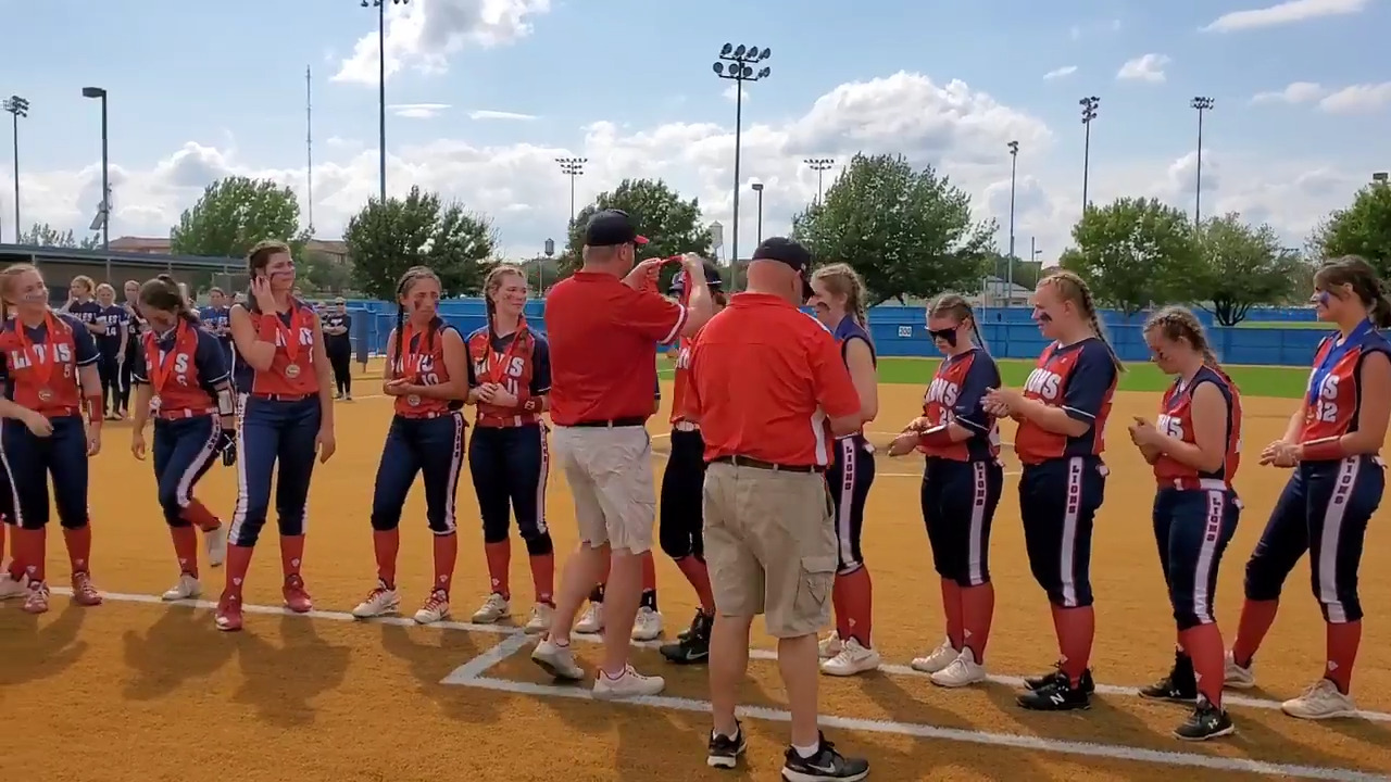 Grapevine Faith softball receives runnerup medals after the TAPPS