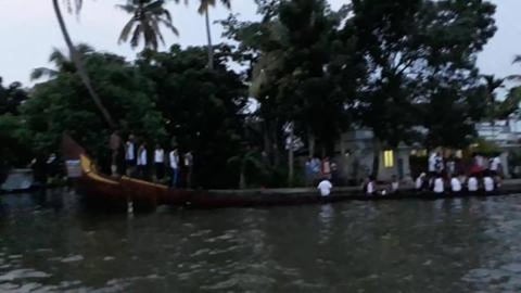 Tired Snake Boat Paddlers Taking Rest In Kerala Backwater...