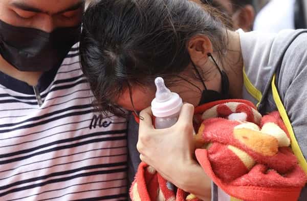Familiares lloran a las víctimas de la matanza en la guardería de Tailandia