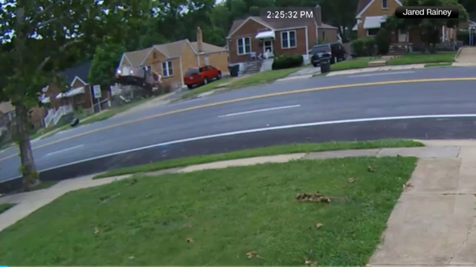 Video captures moment out-of-control car flies through air, slams into house
